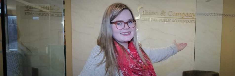 Inviting staff member opening the office door