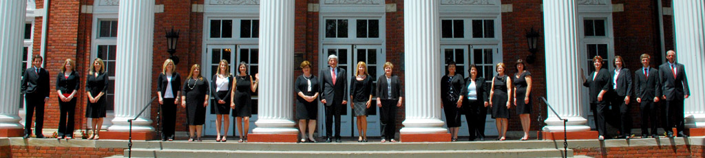 The BNA team enjoying a sunny day near some columns.